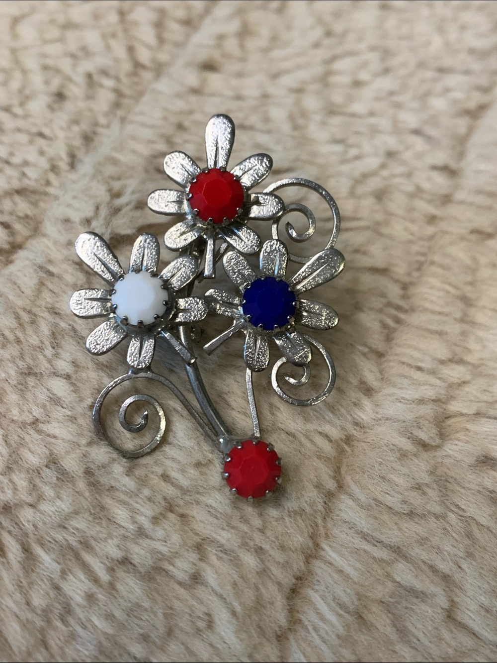 Vintage Silver Floral Brooch with Red, White, and Blue Stones